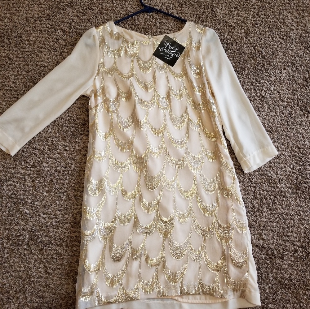 Boutique gold and cream dress.